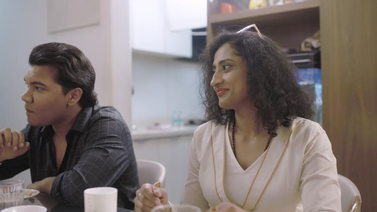 Iswar and Mugdha at the dining table