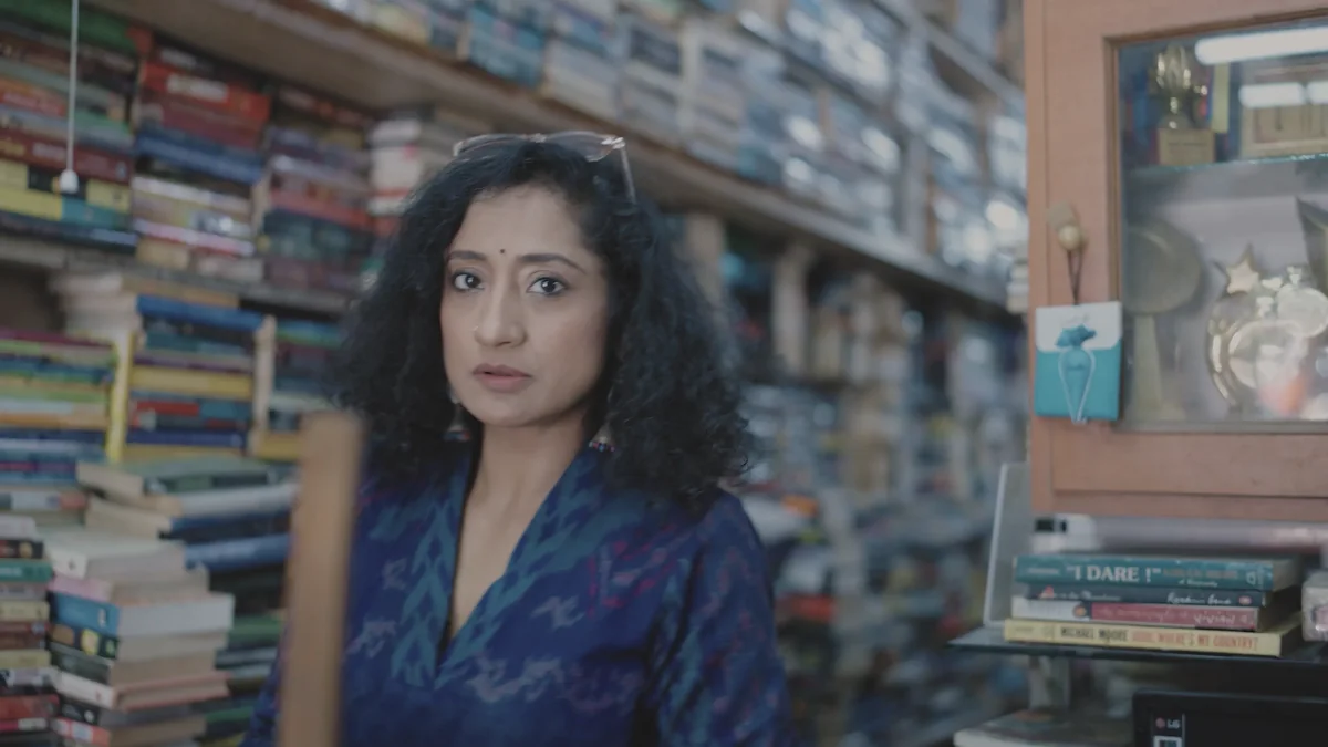 Mugdha Raj among the shelves of her bookshop